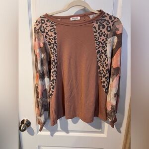 Andree by Unit size Medium multi pattern sweater.